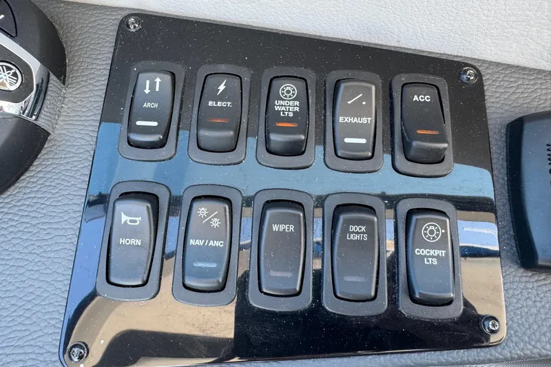 33 Xo Best Deals Of The Year!!1 Yacht Photos Pics Control panel of a 2026 Regal 33 XO boat with labeled switches.