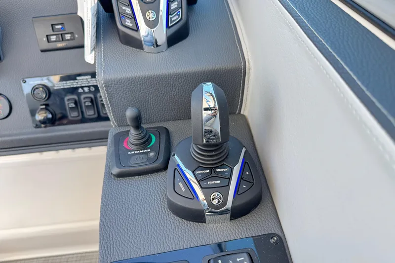 33 Xo Best Deals Of The Year!!1 Yacht Photos Pics Control panel of 2026 Regal 33 XO boat with joystick and buttons.