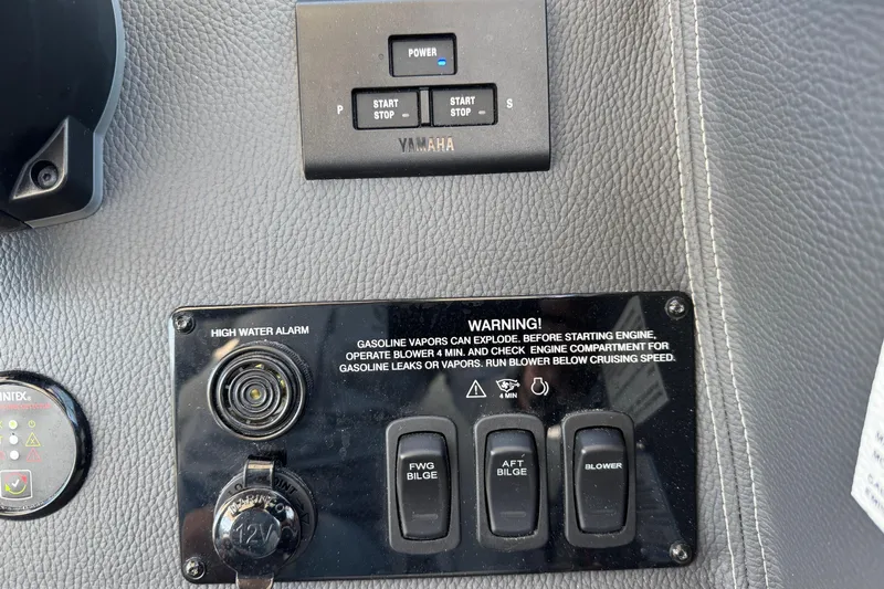 33 Xo Best Deals Of The Year!!1 Yacht Photos Pics Control panel of 2026 Regal 33 XO boat with warning labels and switches.
