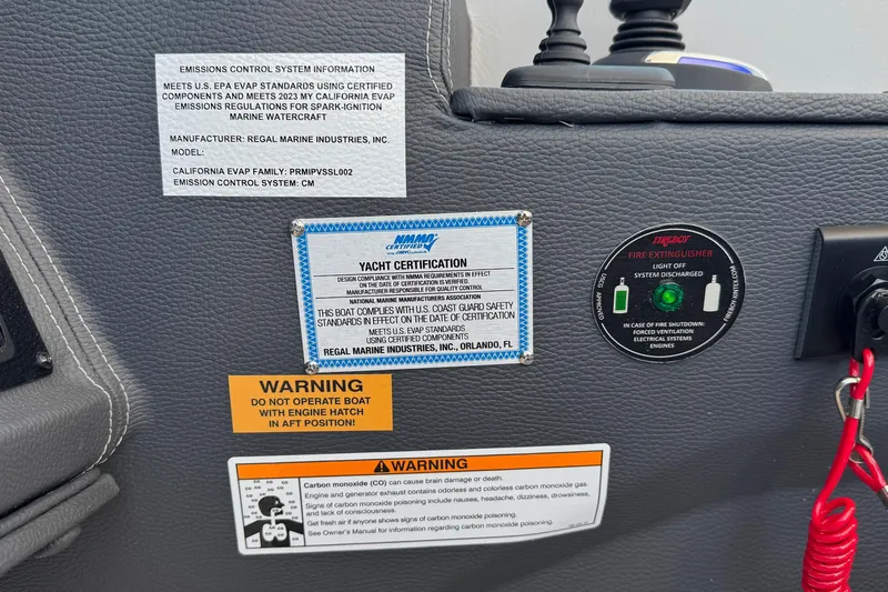 33 Xo Best Deals Of The Year!!1 Yacht Photos Pics Control panel of 2026 Regal 33 XO yacht with safety and certification labels.