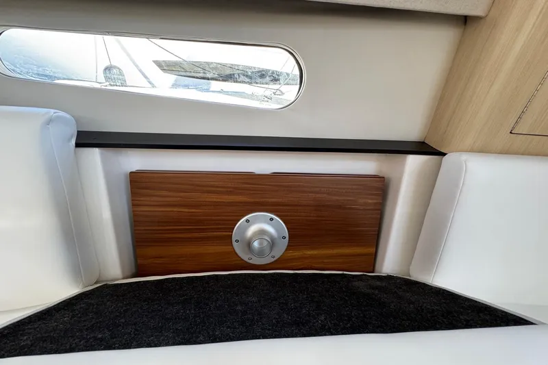 33 Xo Best Deals Of The Year!!1 Yacht Photos Pics Interior of 2026 Regal 33 XO yacht with wood panel and window view.
