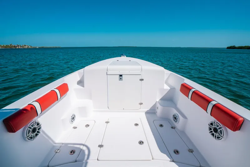  Yacht Photos Pics 2007 Donzi 38 ZF Cuddy boat interior with red accents on open water.