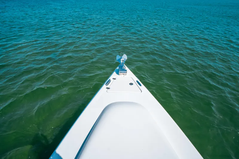  Yacht Photos Pics Bow view of 2007 Donzi 38 ZF Cuddy on open water.