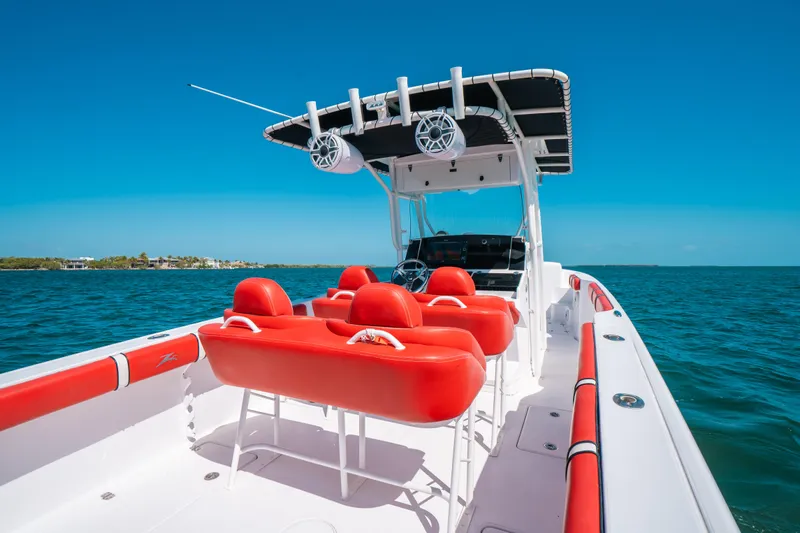  Yacht Photos Pics 2007 Donzi 38 ZF Cuddy boat with red seating on open water.