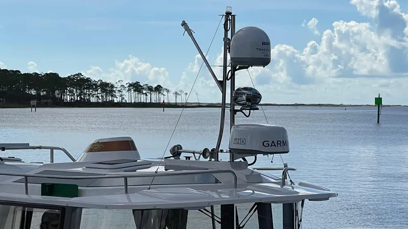  Yacht Photos Pics Ranger Tugs R-29 S 2025 boat with Garmin equipment on calm water.