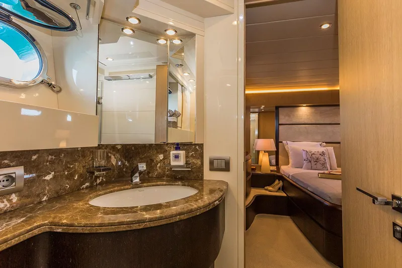 Hope I Yacht Photos Pics Luxurious bathroom and bedroom interior of a 2008 Maiora 20S yacht.