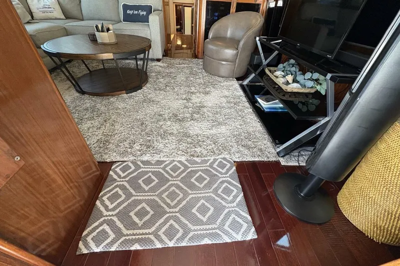 Keepem Flying Yacht Photos Pics Interior of 1985 Hatteras 60 enclosed bridge yacht with modern decor and furnishings.