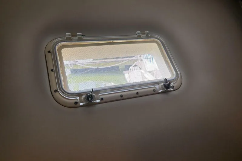 Keepem Flying Yacht Photos Pics Porthole view from 1985 Hatteras 60 enclosed bridge yacht interior.