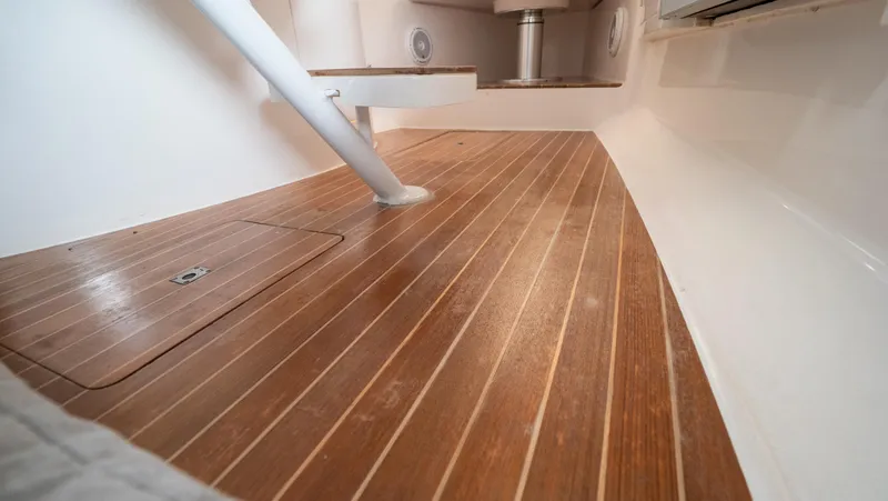  Yacht Photos Pics 2015 Intrepid 400 Cuddy interior with sleek wooden flooring.