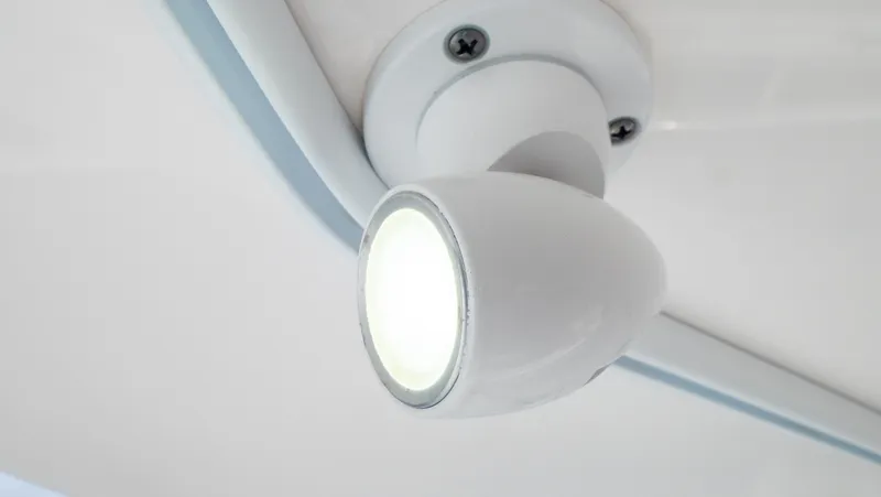  Yacht Photos Pics Close-up of a modern ceiling light fixture on a 2015 Intrepid 400 Cuddy boat.