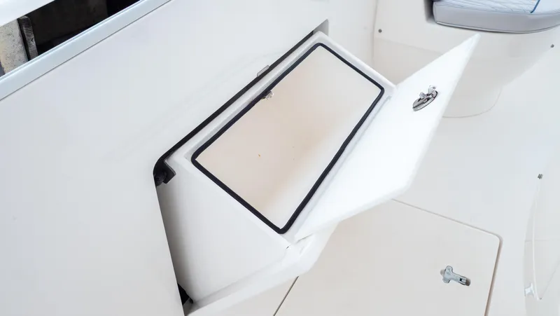  Yacht Photos Pics Open storage compartment on 2015 Intrepid 400 Cuddy boat.