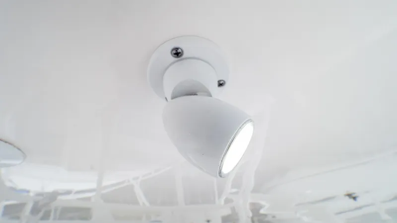  Yacht Photos Pics Ceiling light fixture on 2015 Intrepid 400 Cuddy boat interior.