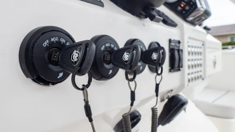  Yacht Photos Pics Ignition switches on a 2015 Intrepid 400 Cuddy boat dashboard.