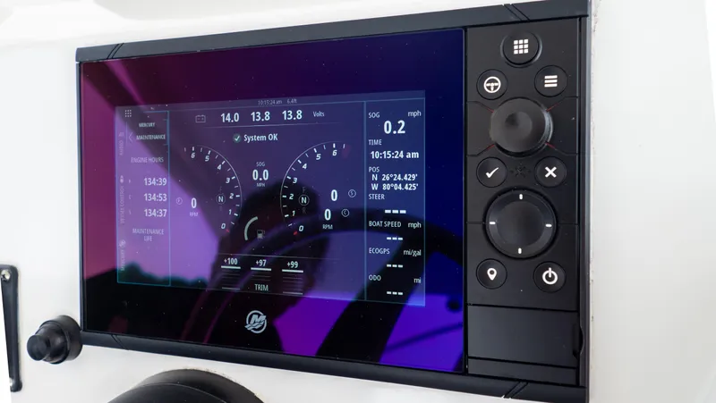  Yacht Photos Pics Dashboard display of a 2015 Intrepid 400 Cuddy boat with navigation controls.