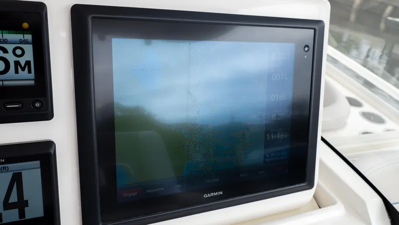  Yacht Photos Pics Garmin navigation display on 2015 Intrepid 400 Cuddy boat dashboard.
