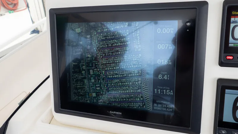  Yacht Photos Pics Garmin navigation display on 2015 Intrepid 400 Cuddy boat dashboard.