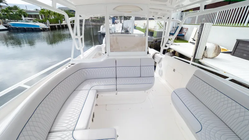  Yacht Photos Pics 2015 Intrepid 400 Cuddy boat interior with spacious seating and sleek design.
