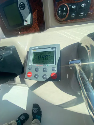 No Fly Zone Yacht Photos Pics Control panel of a 2003 Sea Ray 340 Sundancer boat with navigation instruments.