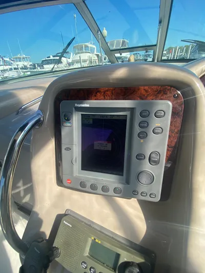 No Fly Zone Yacht Photos Pics Control panel of a 2003 Sea Ray 340 Sundancer boat with navigation equipment.