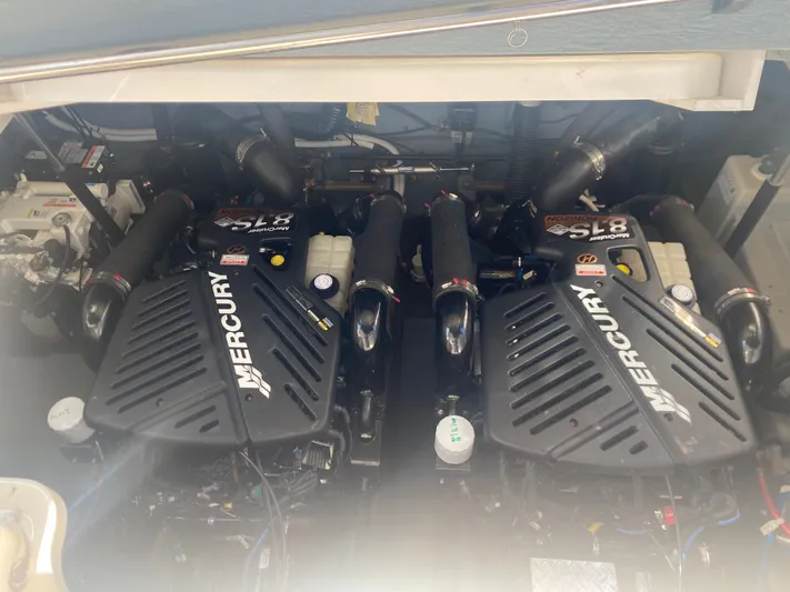No Fly Zone Yacht Photos Pics Engine compartment of a 2003 Sea Ray 340 Sundancer with twin Mercury engines.