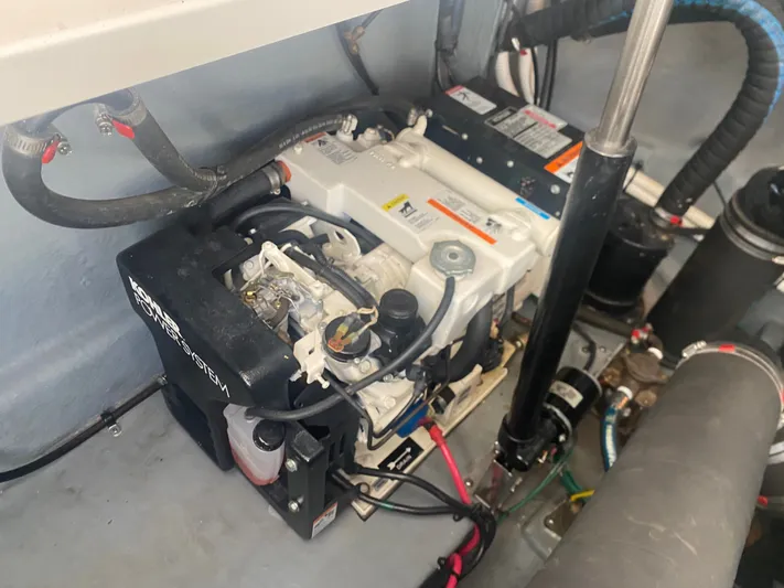 No Fly Zone Yacht Photos Pics Engine compartment of 2003 Sea Ray 340 Sundancer with Kohler power system.