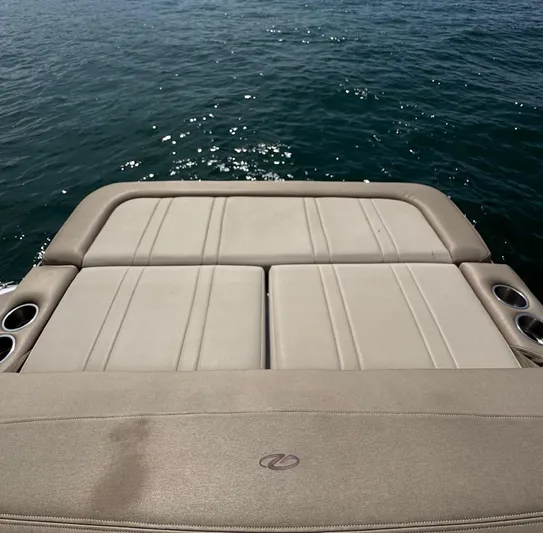 Wine-n-down Yacht Photos Pics 2014 Regal 32 Express boat's sunpad overlooking the ocean.