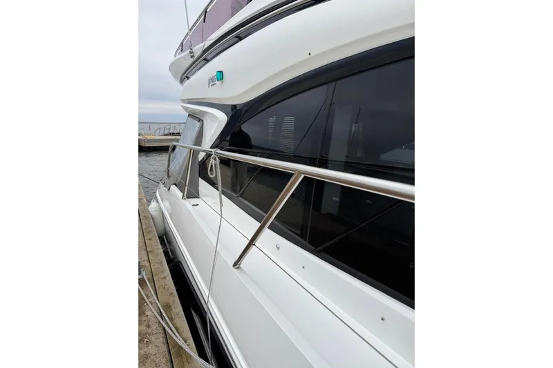  Yacht Photos Pics 2021 Princess F45 yacht docked, showcasing sleek design and modern features.