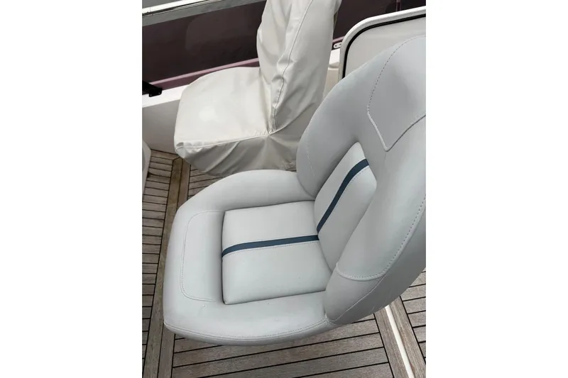  Yacht Photos Pics Luxurious seating on 2021 Princess F45 yacht with elegant design and wood flooring.