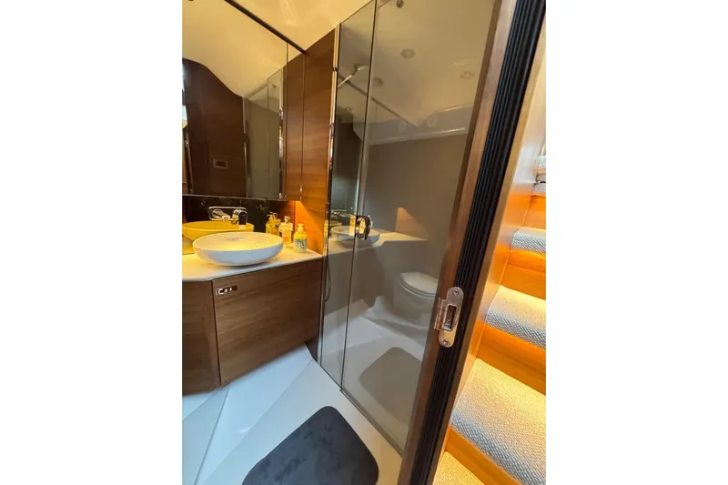  Yacht Photos Pics Luxurious bathroom in 2021 Princess F45 yacht with modern fixtures and elegant design.