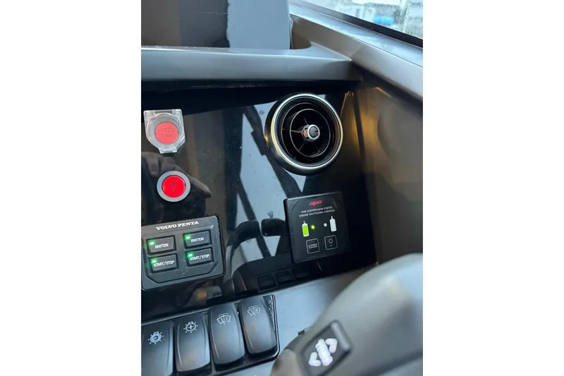  Yacht Photos Pics Control panel of 2021 Princess F45 yacht with buttons and air vent.