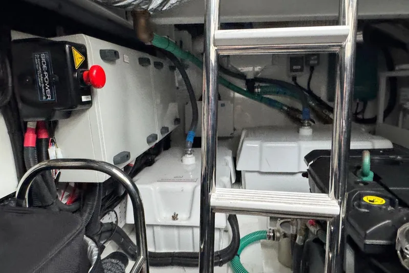  Yacht Photos Pics Engine room of a 2021 Princess F45 yacht with visible equipment and wiring.