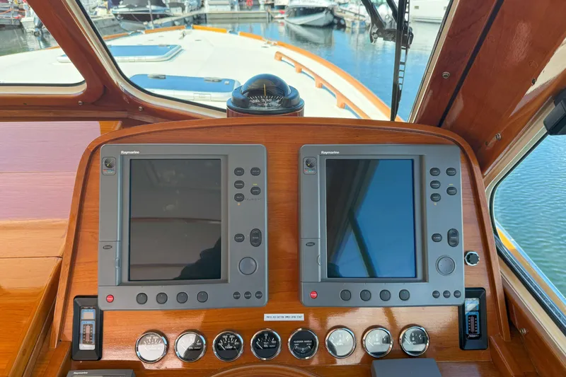 Madeline Kathleen Yacht Photos Pics Hinckley Talaria 40 yacht dashboard with navigation screens and controls, 2003 model.