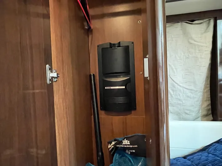  Yacht Photos Pics Interior of 2015 Sea Ray 350 Sundancer showing a storage compartment with a mounted device.
