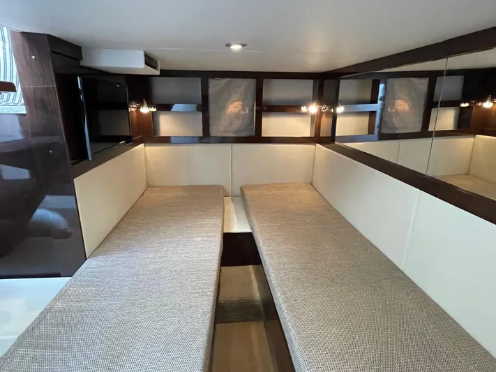  Yacht Photos Pics Interior cabin of 2015 Sea Ray 350 Sundancer with twin beds and modern design.