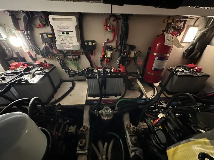  Yacht Photos Pics Engine room of 2015 Sea Ray 350 Sundancer with batteries and fire extinguisher.