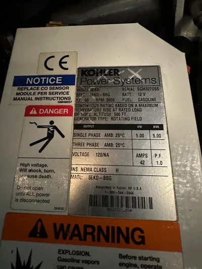  Yacht Photos Pics Kohler power system label with safety warnings on a 2015 Sea Ray 350 Sundancer.