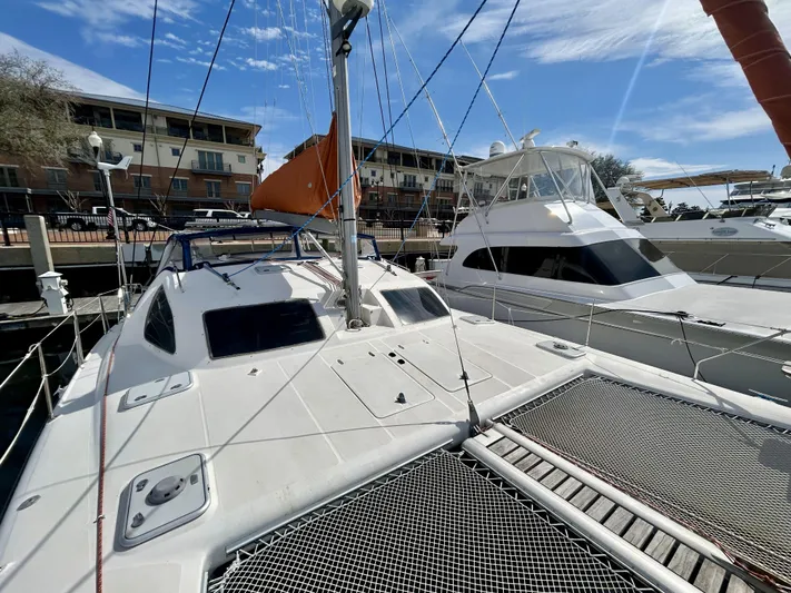 Hazey Daze Yacht Photos Pics Sailboat docked at marina, Voyage Maxim 2001 model, sunny day with clear skies.