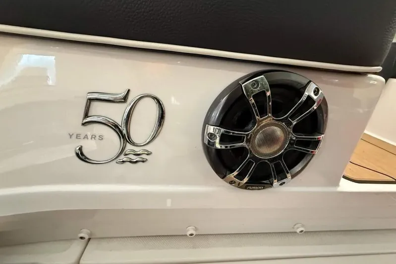  Yacht Photos Pics 2021 Regal 29 OBX boat, 50th anniversary emblem, Fusion speaker detail.