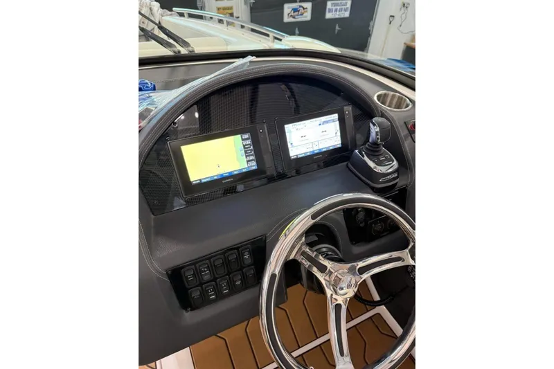  Yacht Photos Pics 2021 Regal 29 OBX boat dashboard with dual screens and joystick controls.