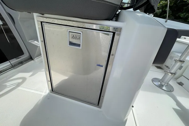  Yacht Photos Pics 2021 Jeanneau Leader 9.0 WA boat interior with built-in storage compartment.