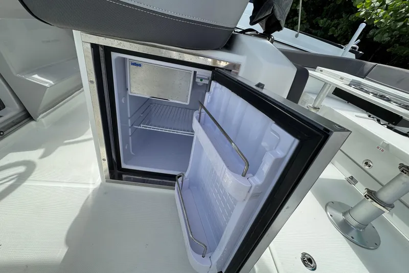  Yacht Photos Pics Open refrigerator on 2021 Jeanneau Leader 9.0 WA boat deck.