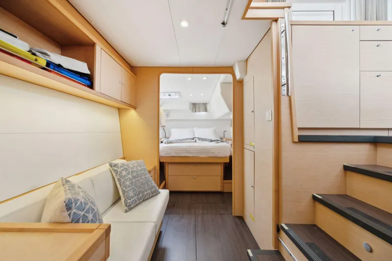 Cruisin Cajun Yacht Photos Pics 2017 Lagoon 450 F yacht interior with cozy seating and modern bedroom.