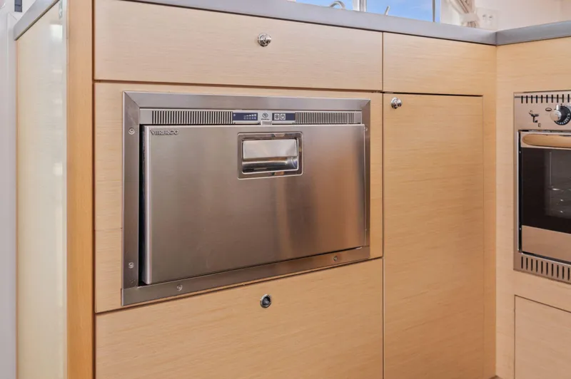 Cruisin Cajun Yacht Photos Pics Modern kitchen with stainless steel appliances on a 2017 Lagoon 450 F yacht.