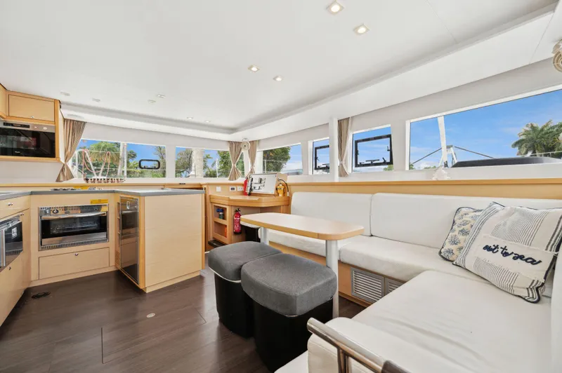 Cruisin Cajun Yacht Photos Pics Interior of 2017 Lagoon 450 F catamaran with modern kitchen and seating area.