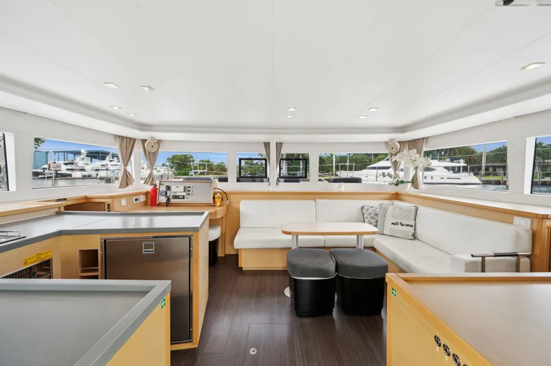 Cruisin Cajun Yacht Photos Pics Interior of 2017 Lagoon 450 F catamaran with modern seating and panoramic windows.