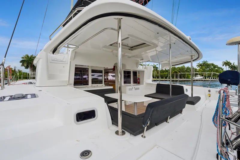 Cruisin Cajun Yacht Photos Pics 2017 Lagoon 450 F catamaran with spacious outdoor seating and sleek design.