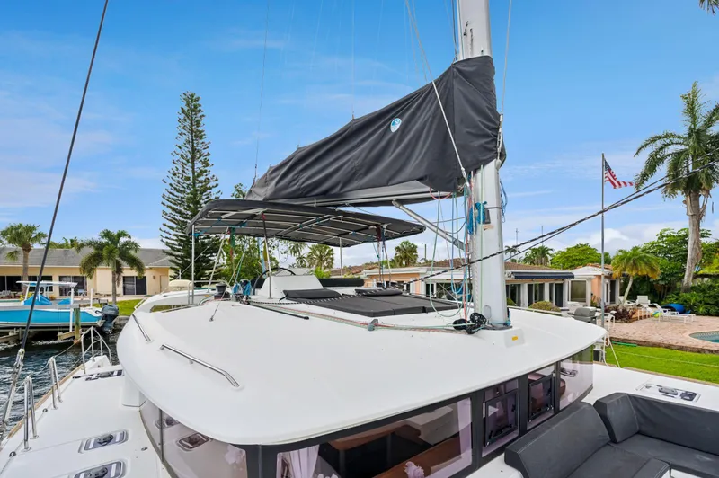 Cruisin Cajun Yacht Photos Pics 2017 Lagoon 450 F catamaran docked, featuring spacious deck and modern design.