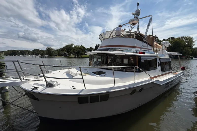  Yacht Photos Pics 2021 Ranger Tugs R-41CB yacht docked on a sunny day.