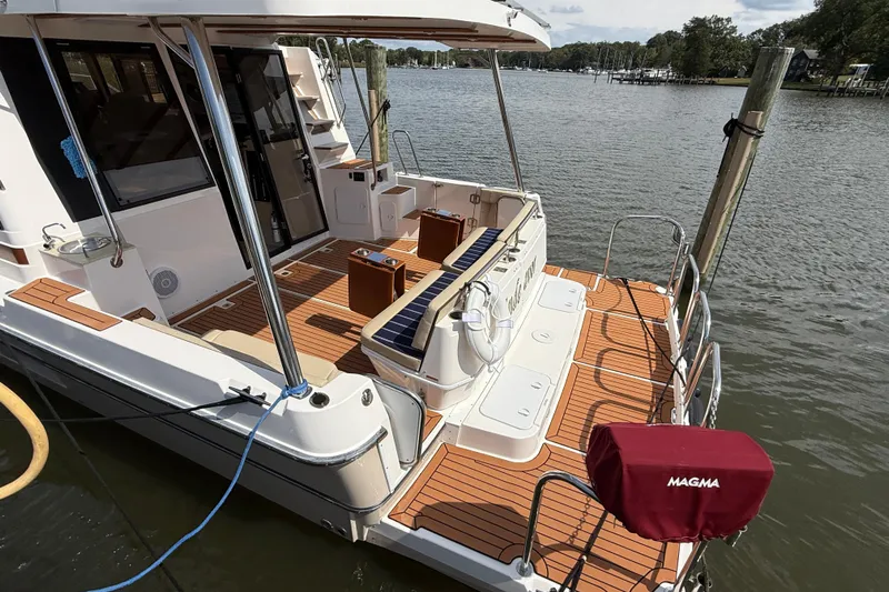  Yacht Photos Pics 2021 Ranger Tugs R-41CB boat with spacious deck and elegant wood finish.