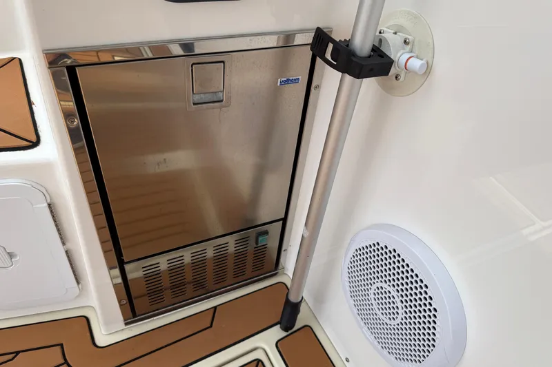  Yacht Photos Pics 2021 Ranger Tugs R-41CB boat interior with stainless steel appliance and speaker.